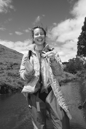 Lucy Carew-Reid with her first trout, a better than average brown from a Gippsland stream.